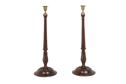 Carved mahogany candlesticks with brass fittings, England, circa Default