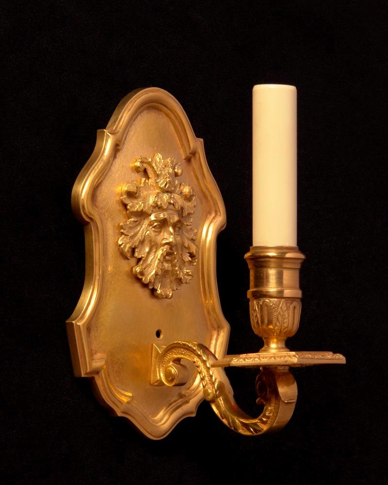 Regence style gilded bronze one light sconce with mask, wired